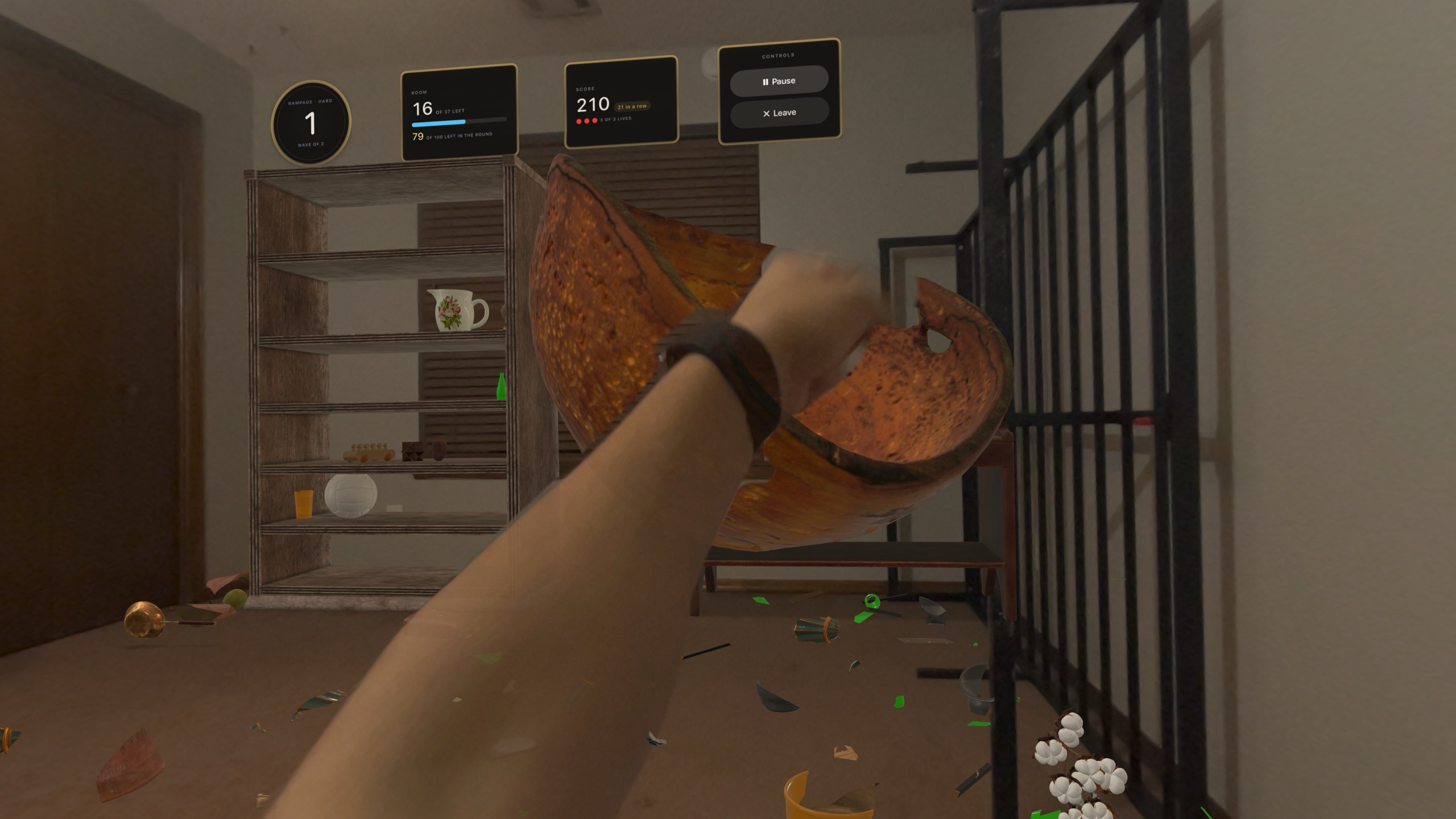 Playing Shatter Punch in a real home: a fist breaks a bowl, our shelf stands by the stairs, and the score hangs on the wall in frames
